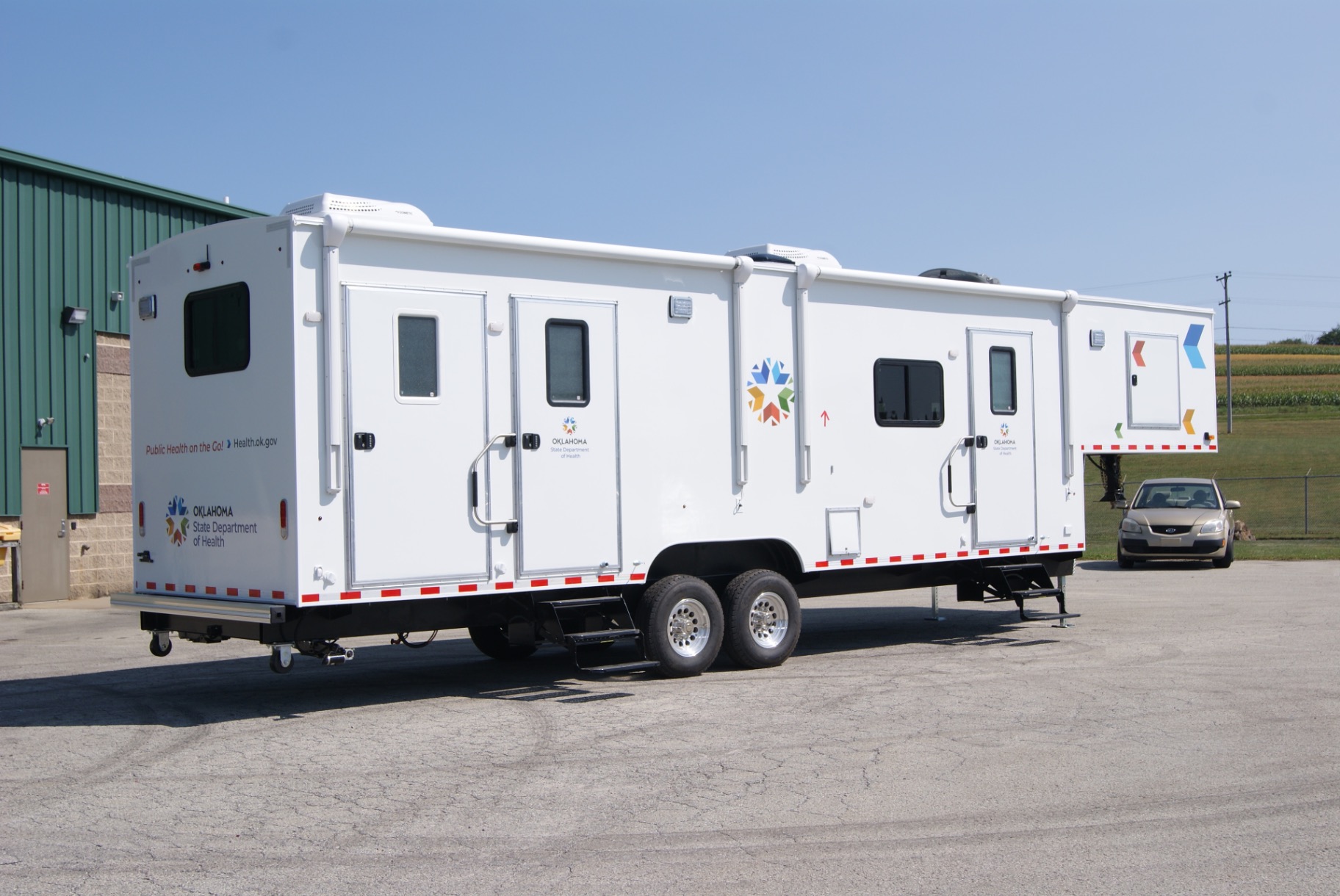 An exterior view of a Medical Exam 36FW trailer made for the OK Health Department.