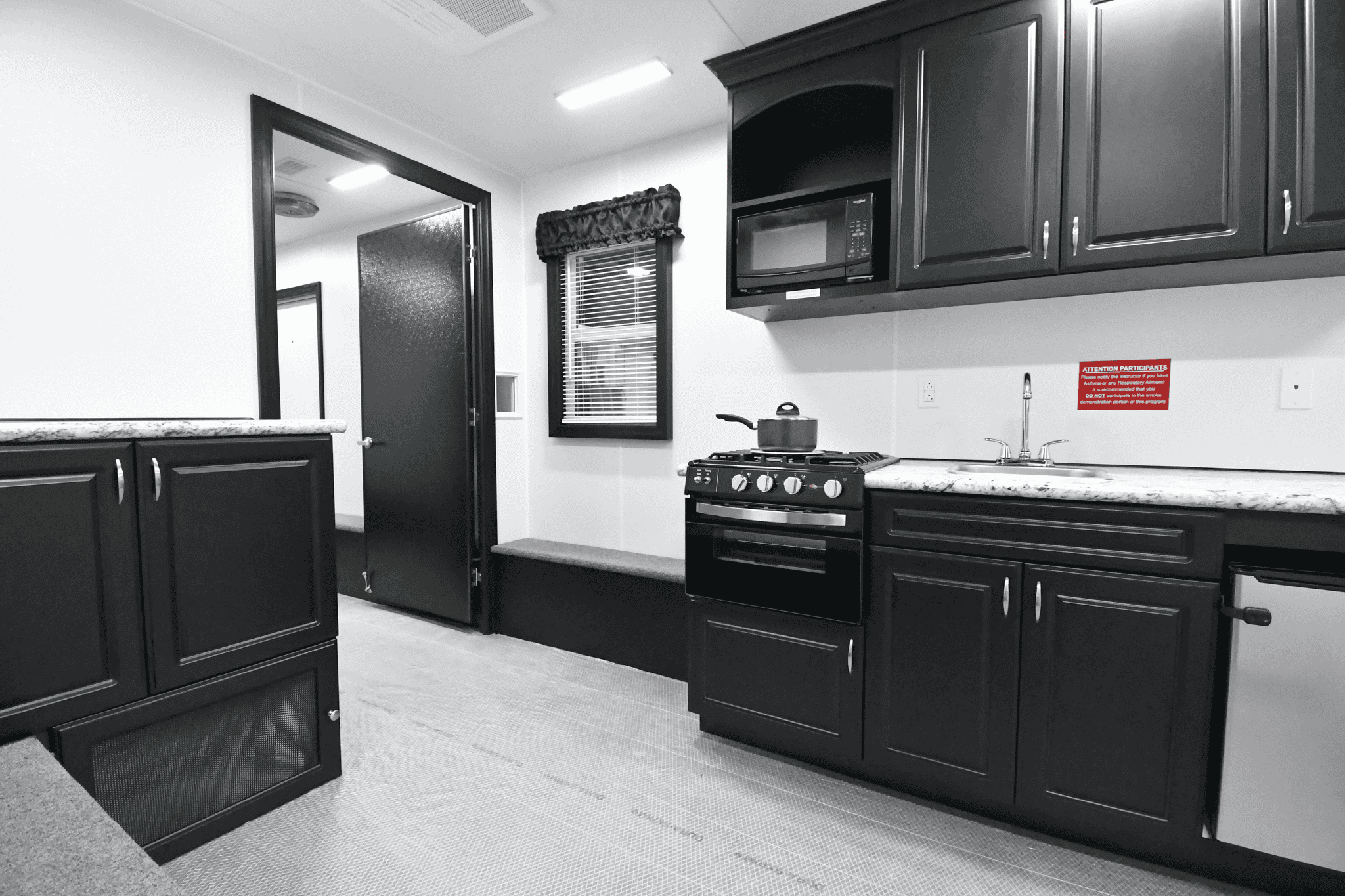 A view of the kitchen stage inside the 3500 Fire Safety House made for Sandy, UT.