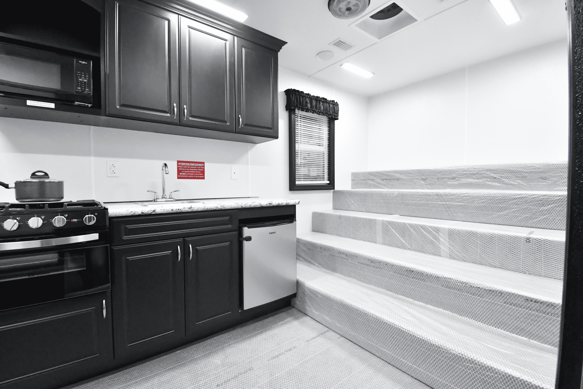 A view of the kitchen stage inside the 3500 Fire Safety House made for Sandy, UT.