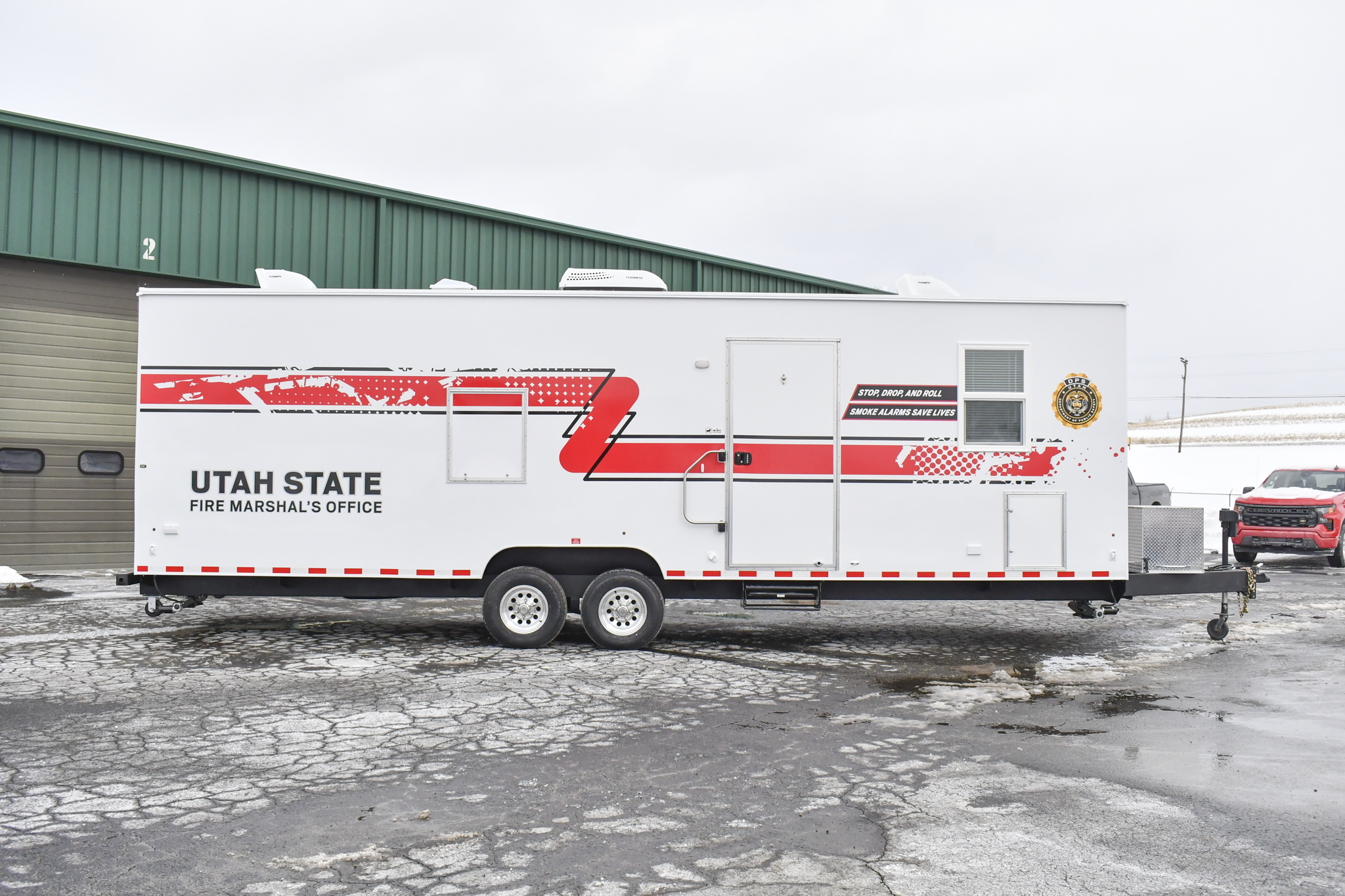 A side view of the 3500 Fire Safety House made for Sandy, UT.