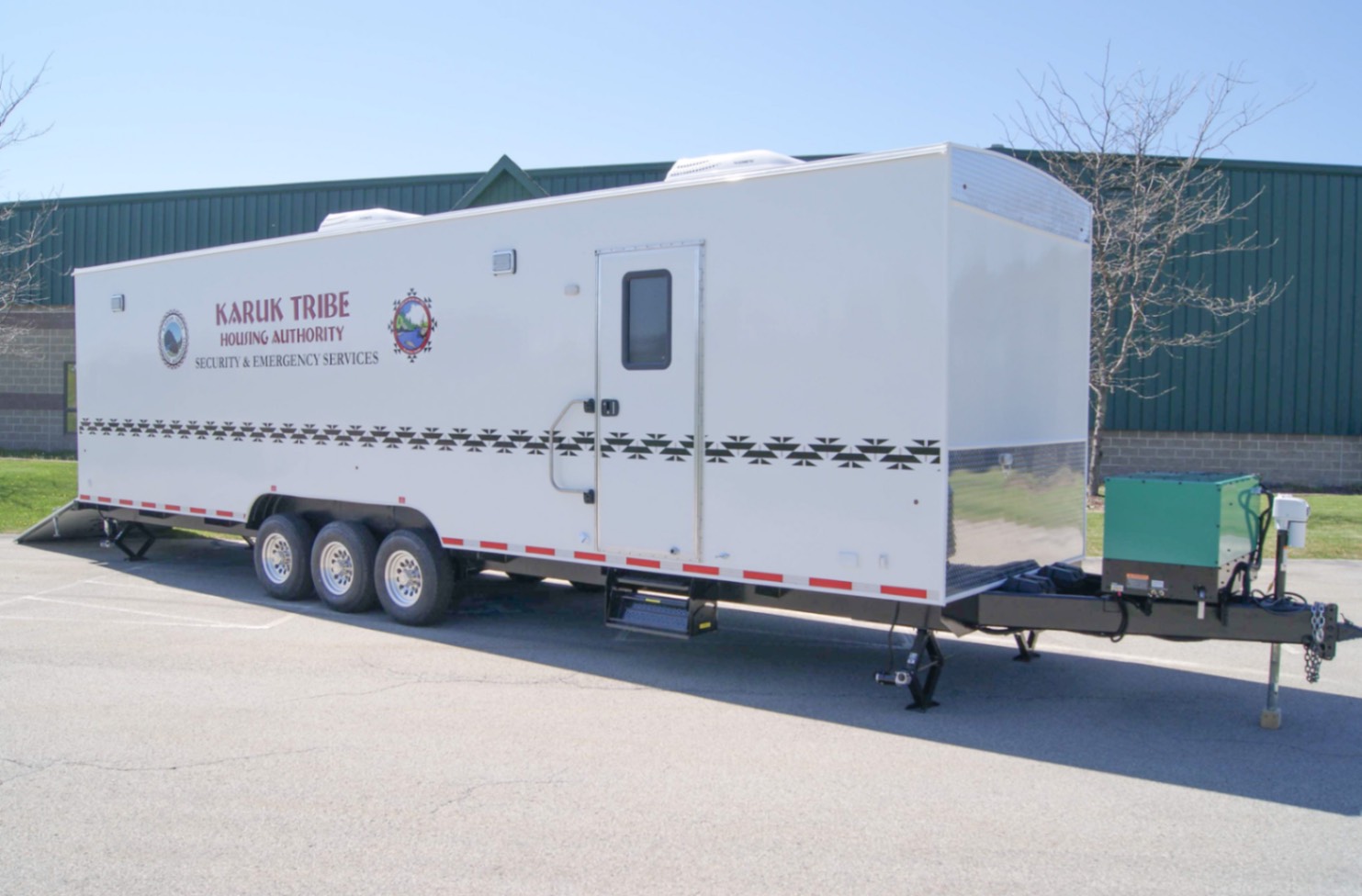 An exterior view of the Command 39 Rear Cargo made for the Karuk Tribe in CA. The rear door is down.