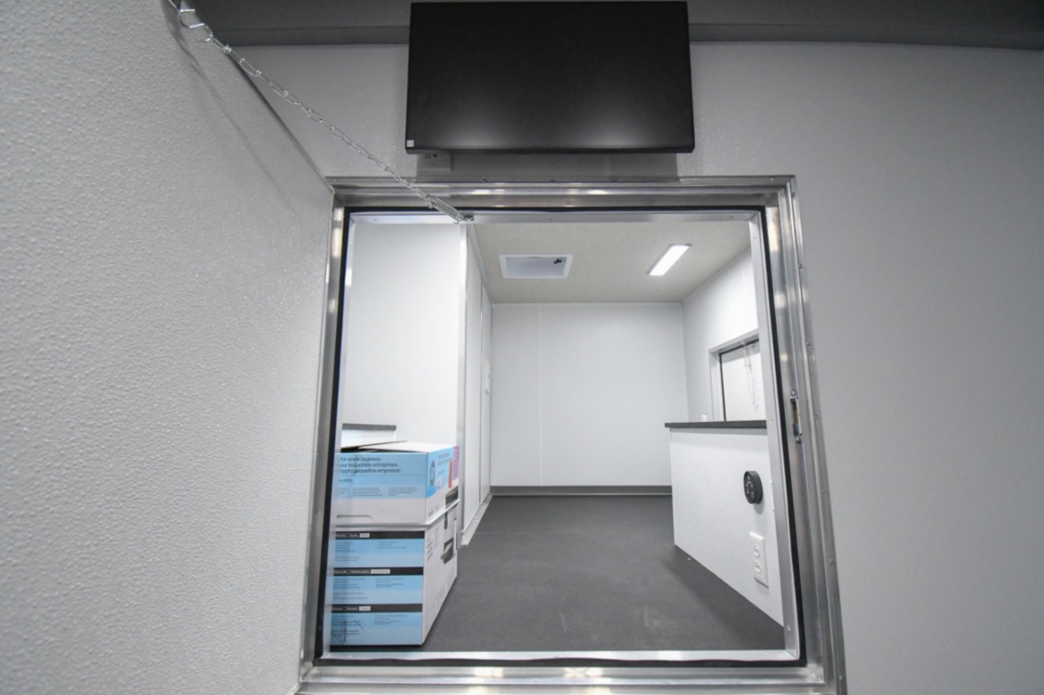 The door to the fifth wheel storage area inside the unit made for Franklin, TN.