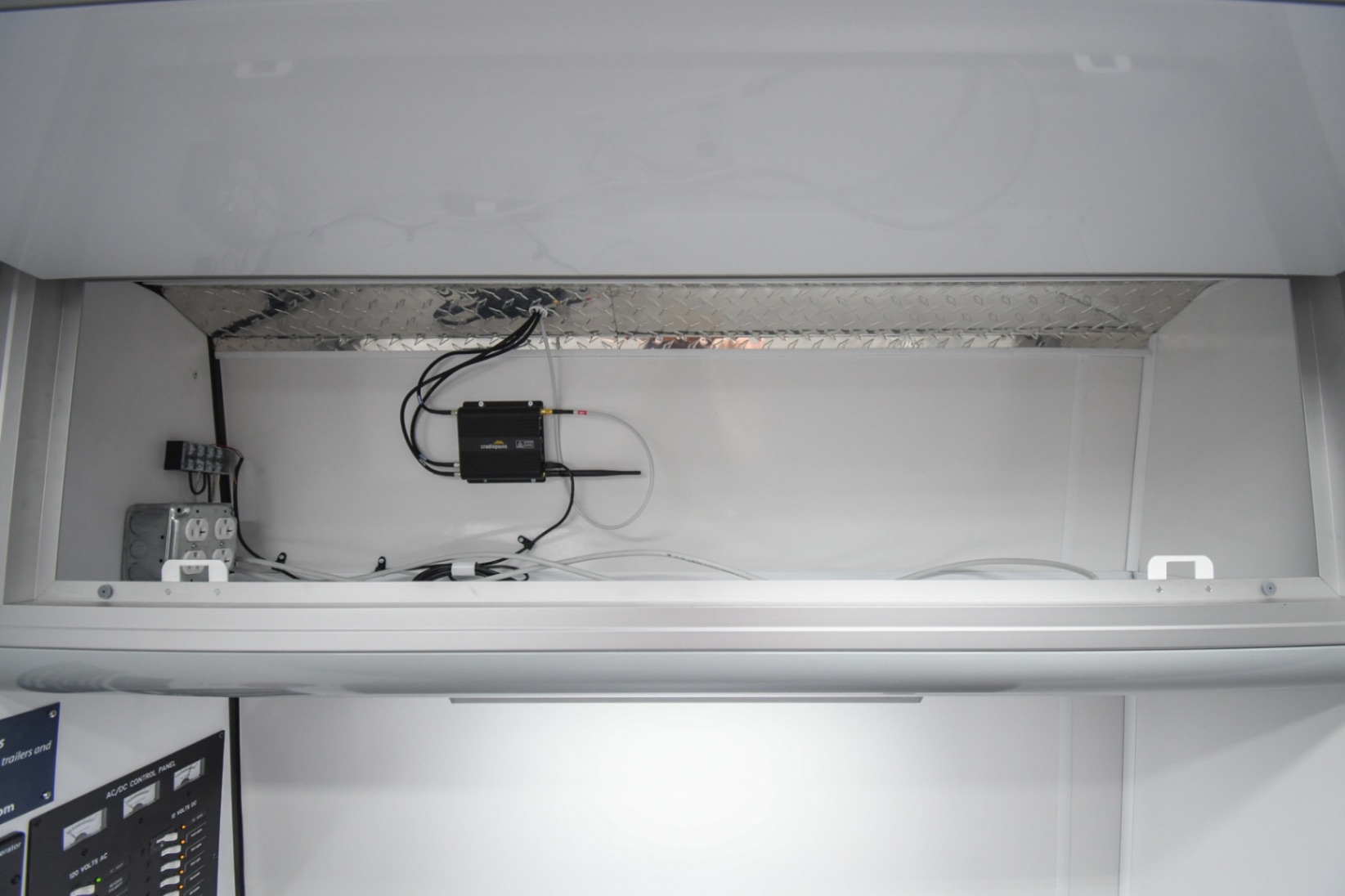 The CradlePoint WiFi router inside the Mobile Immunization sprinter made for Chicago, IL.