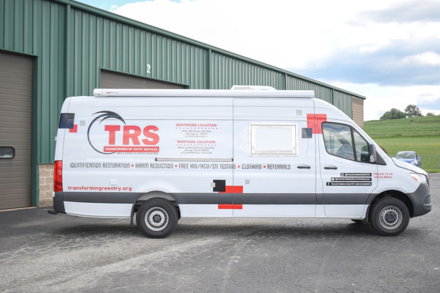 A side view of the Mobile Immunization sprinter made for Chicago, IL.