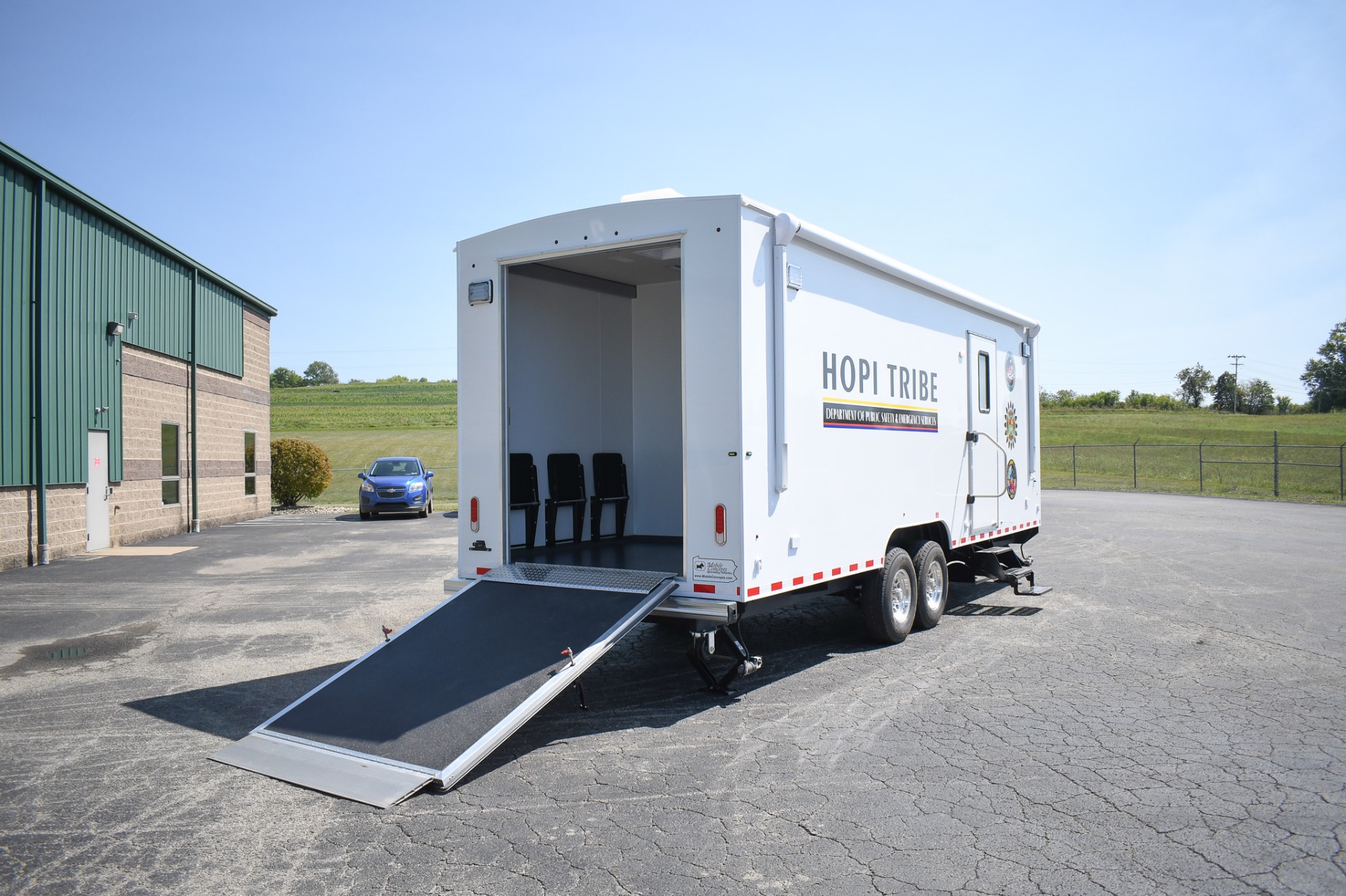 An exterior view of the unit made for Kykostmovi, AZ. The rear ramp is down.