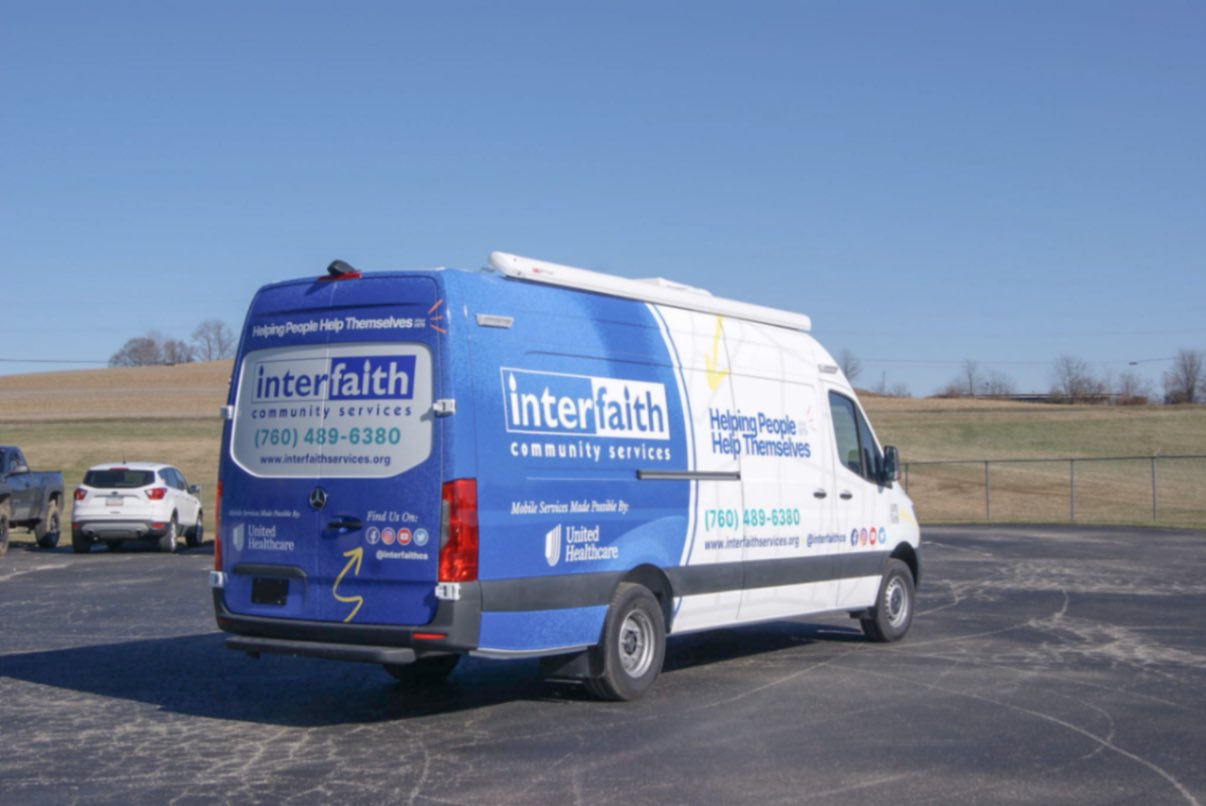 An exterior view of the Outreach Sprinter van made for Escondido, CA.