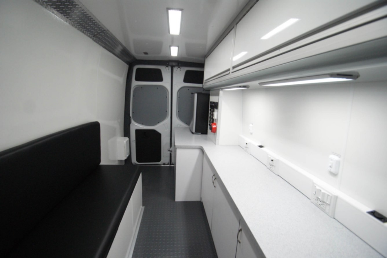 A front-to-back view inside the Outreach Sprinter van made for Camp Hill, PA.