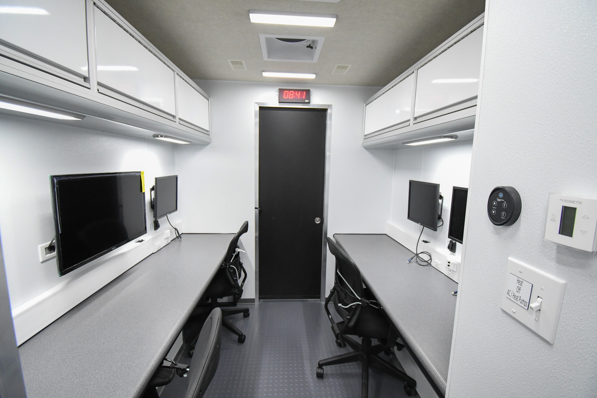 A view of three workstations inside the unit for Caribou, ME.