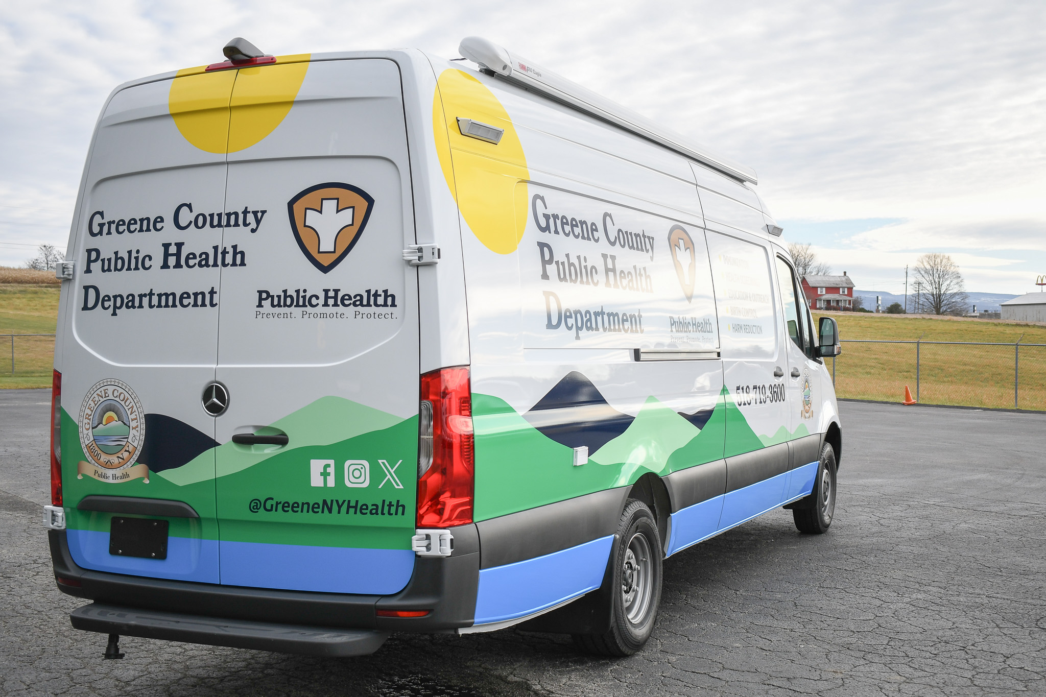 An angled profile showcasing the graphics on the backend of Greene County's unit.