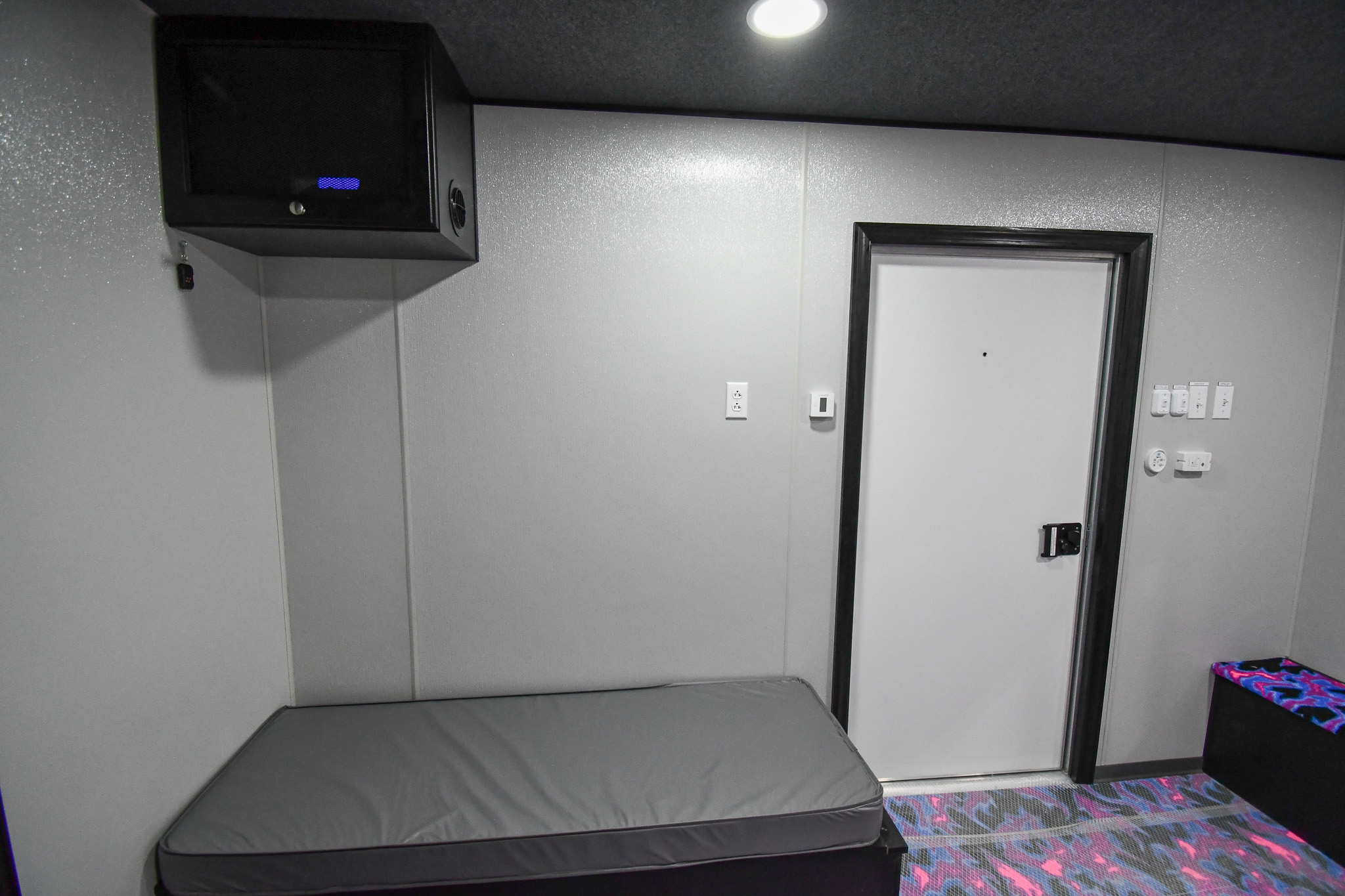 A view of the bedroom stage and a smoke machine inside the unit for Merrillville, IN.