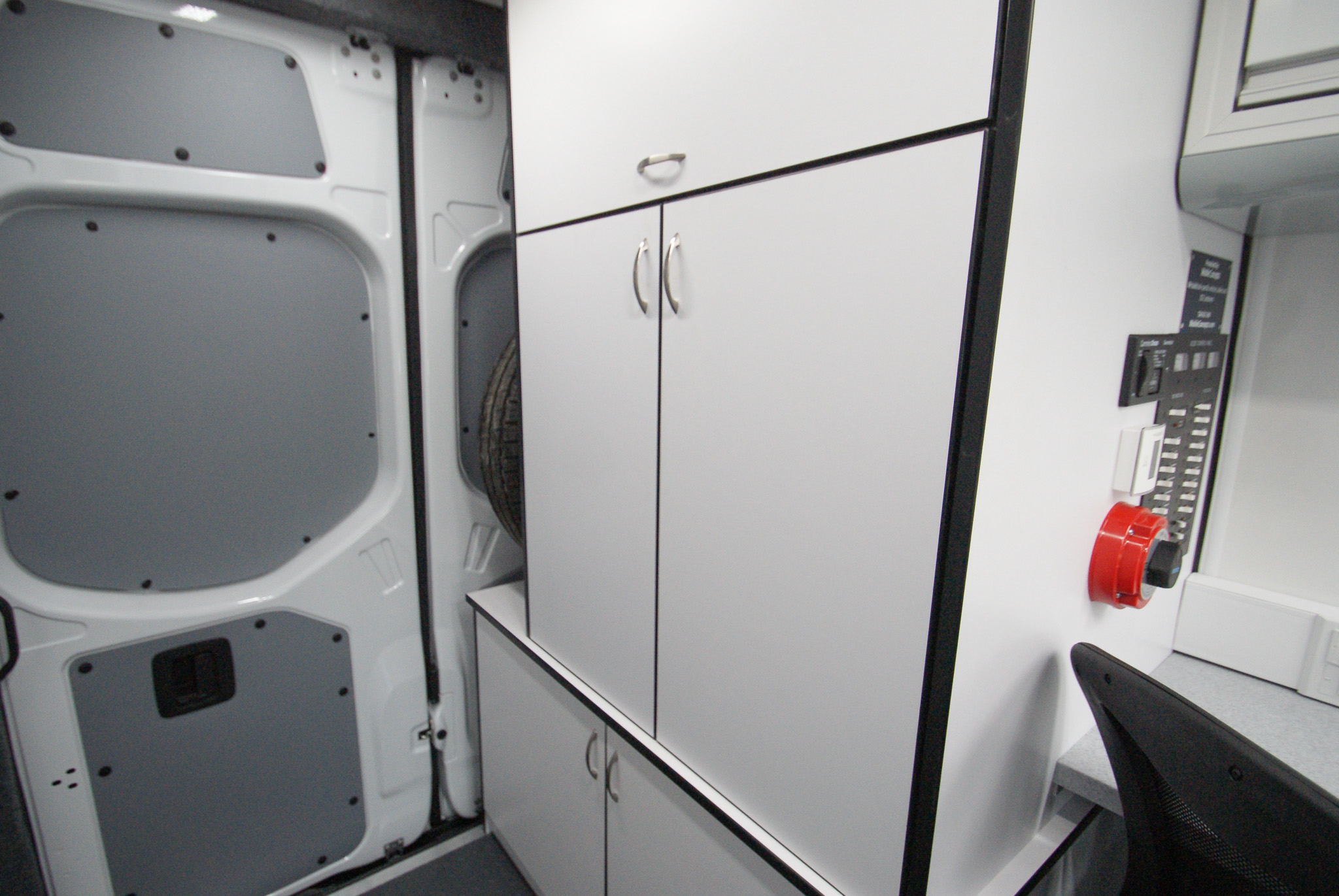 A view of the generator cabinet and storage cabinet inside the units for Talledaga, AL.