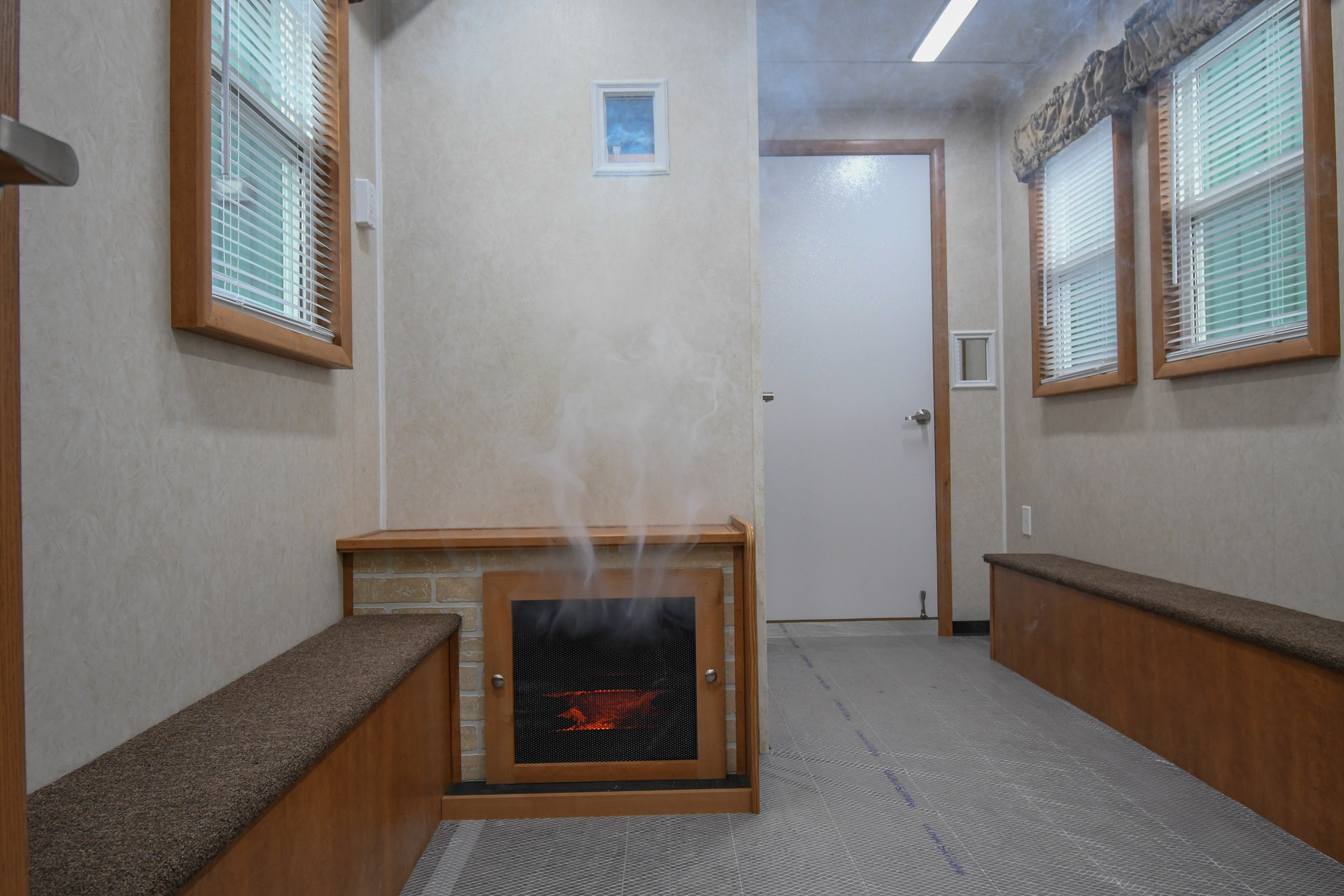The smoking fireplace inside the units for Sandy, UT.