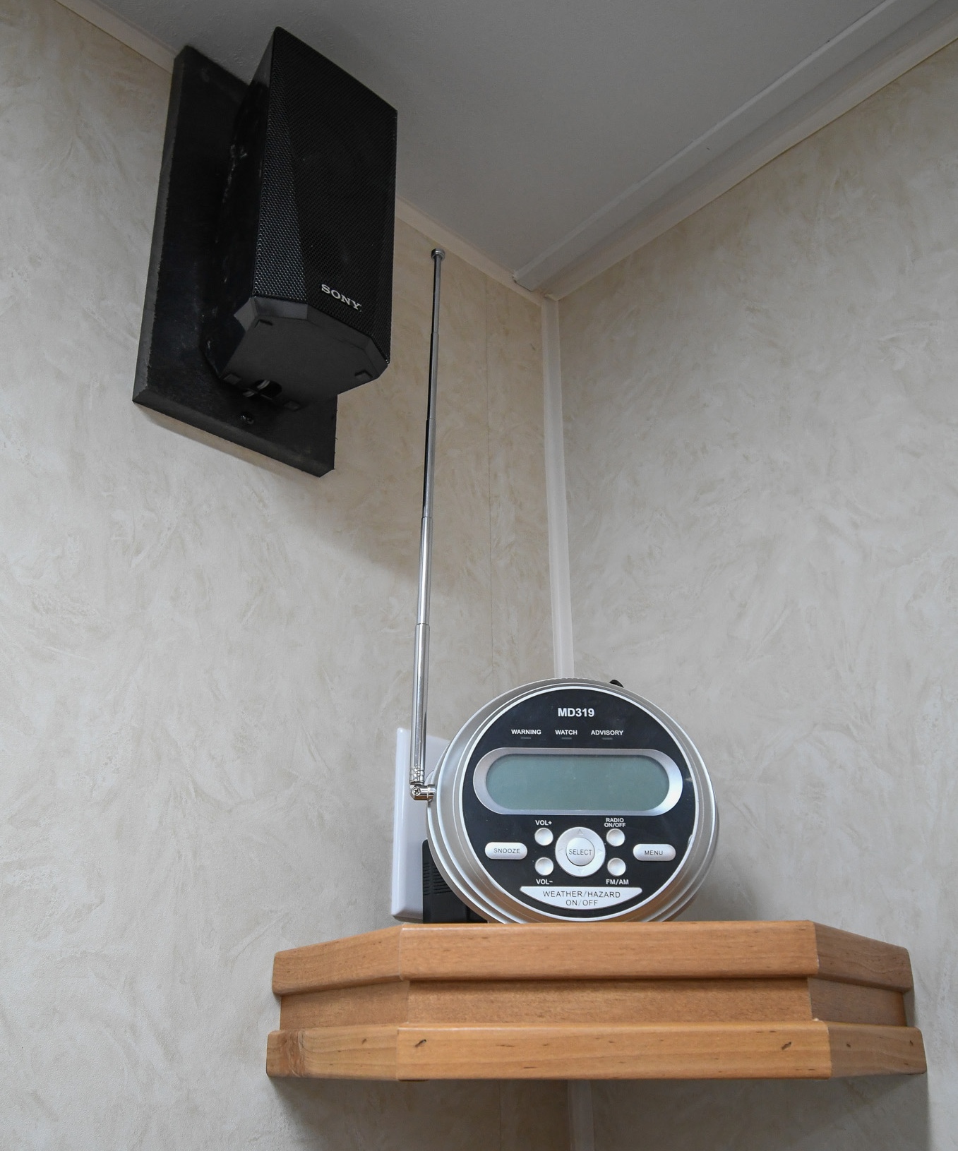 A view of one of the surround sound speakers and the weather radio.
