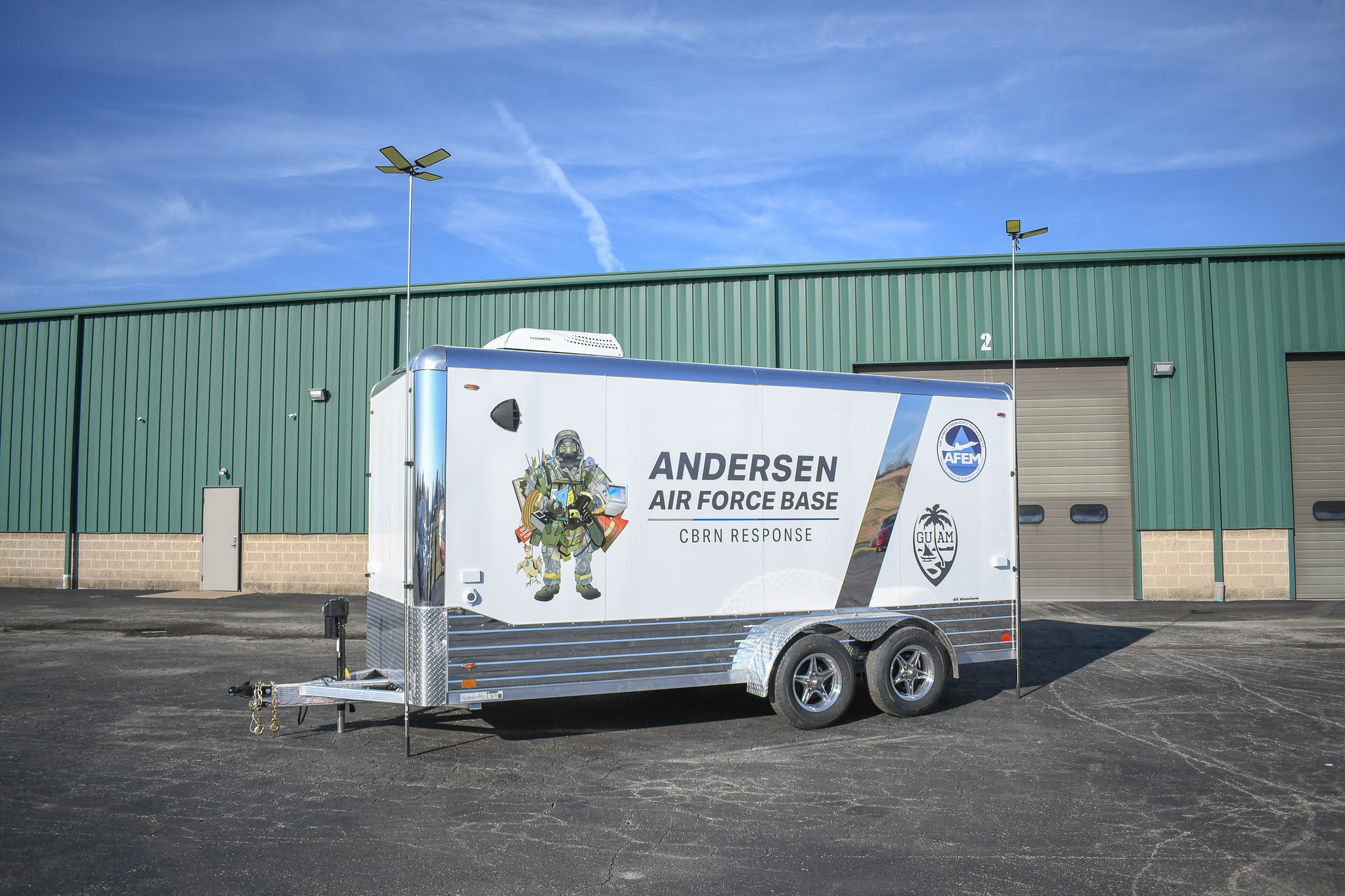 An exterior view of the unit for the Anderson AFB in Guam. Two of the attachable light poles are in place.
