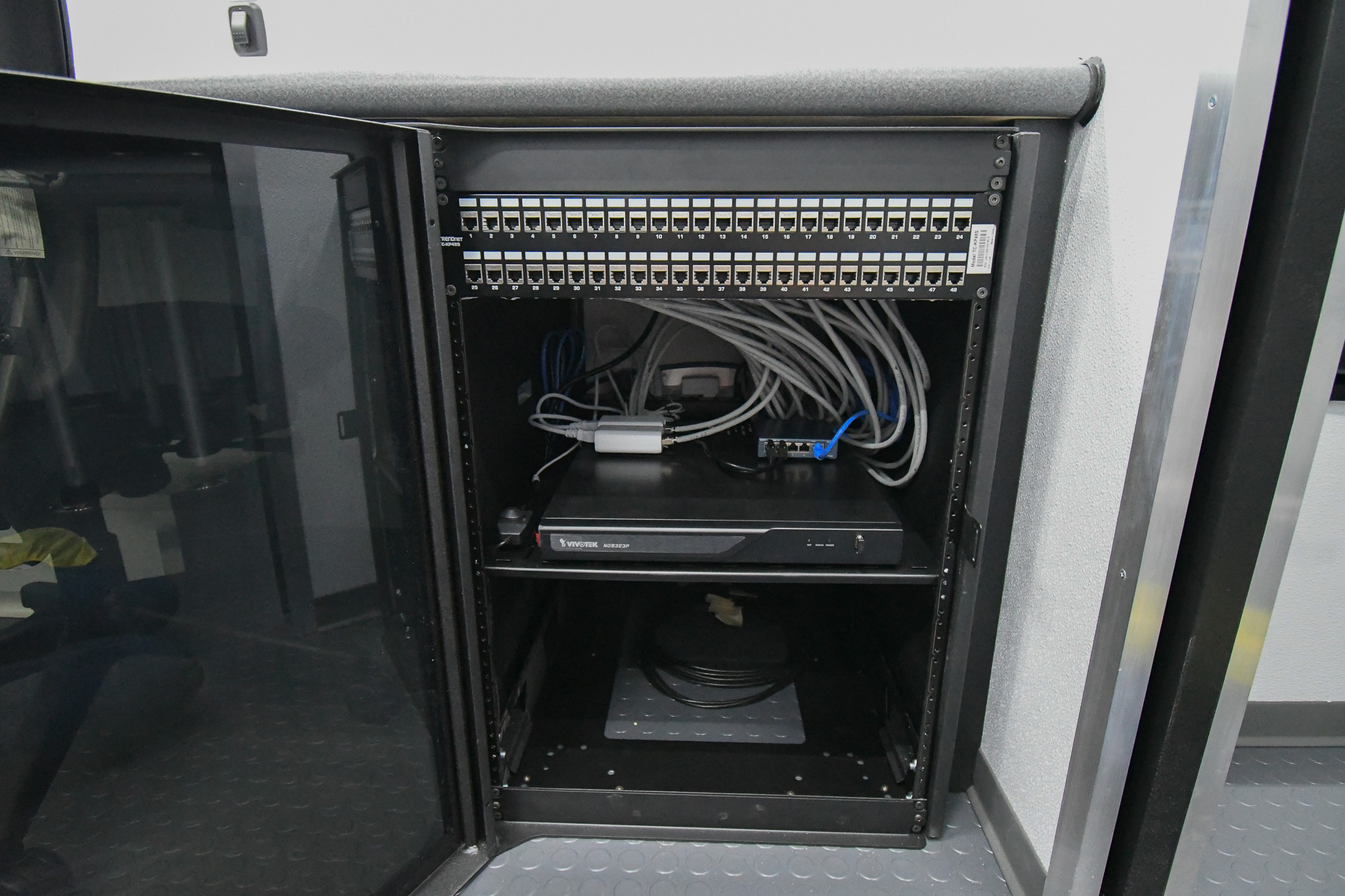 A cabinet featuring an electronics rack inside the unit for Richland County, MT.