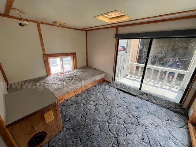 The bedroom stage inside the HD-2800 Smoke House Trailer.