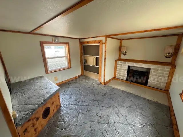 The living room stage inside the HD-2800 Smoke House Trailer.