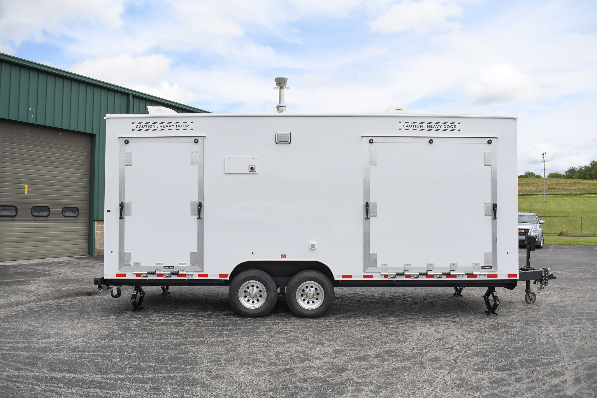 A side view of the unit for Peterson AFB in CO. The ramps are up.