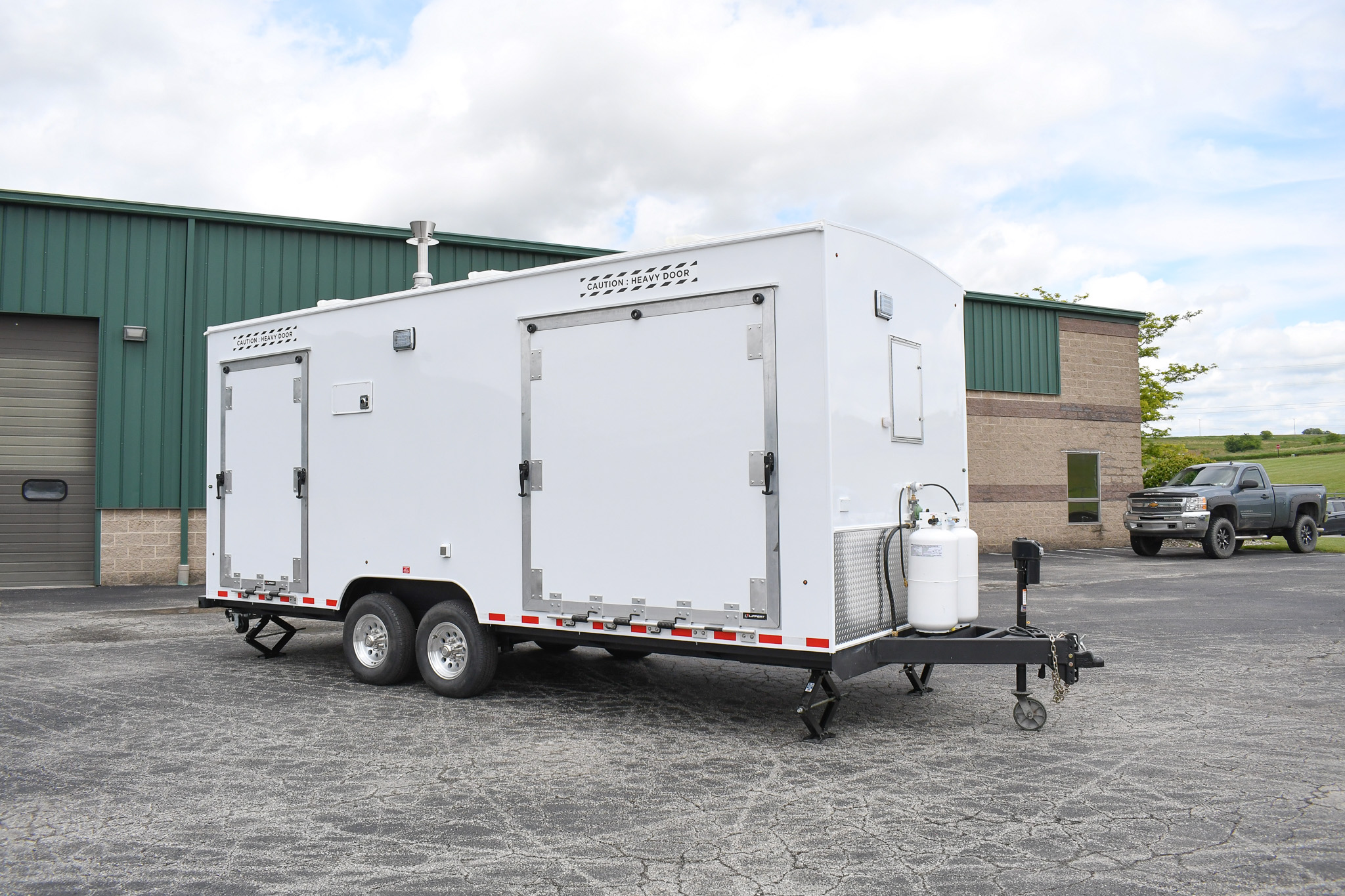 An exterior of the unit for Peterson AFB in CO. The ramps are up.