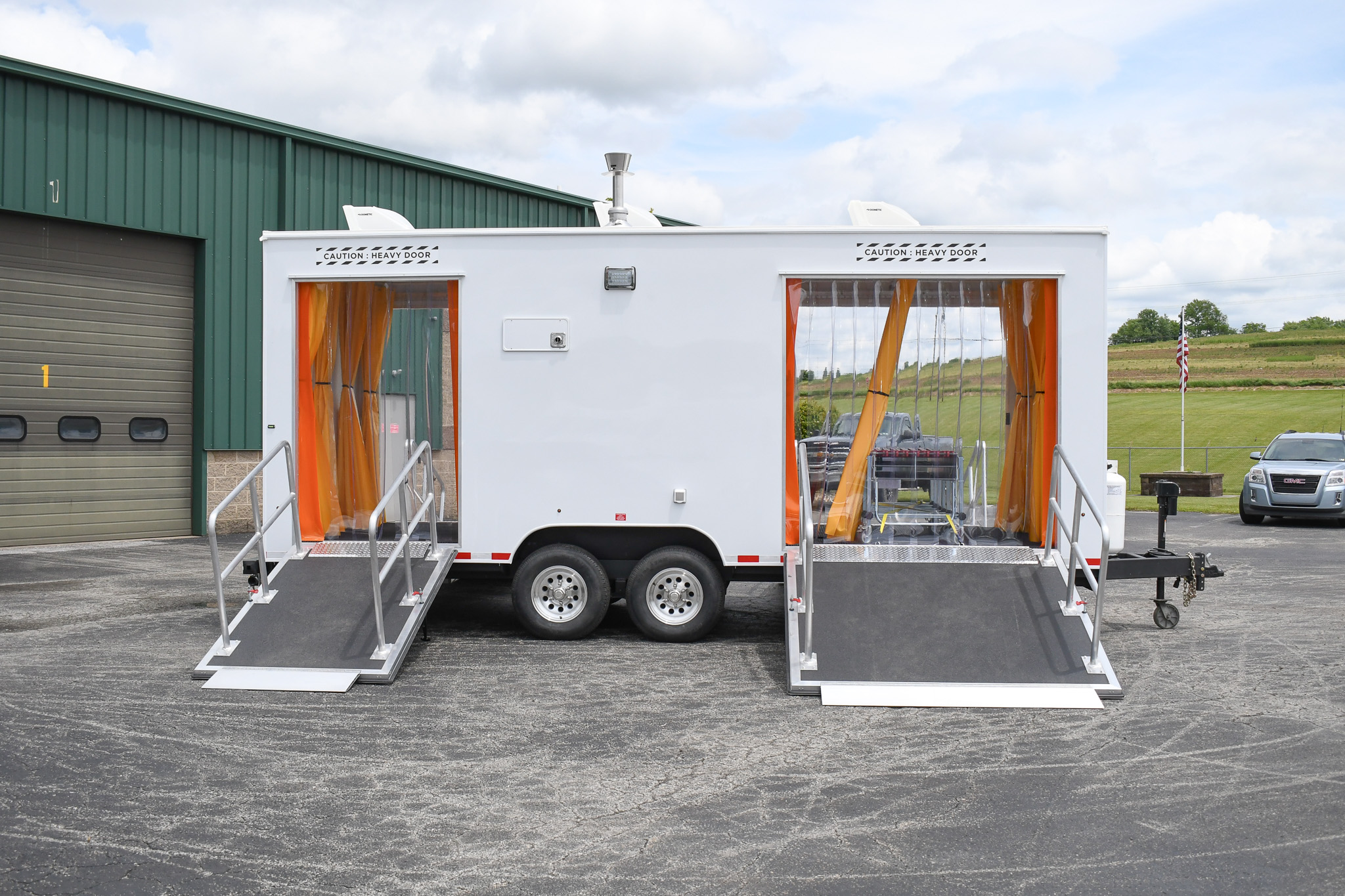 A side view of the unit for Peterson AFB in CO. The ramps are down.