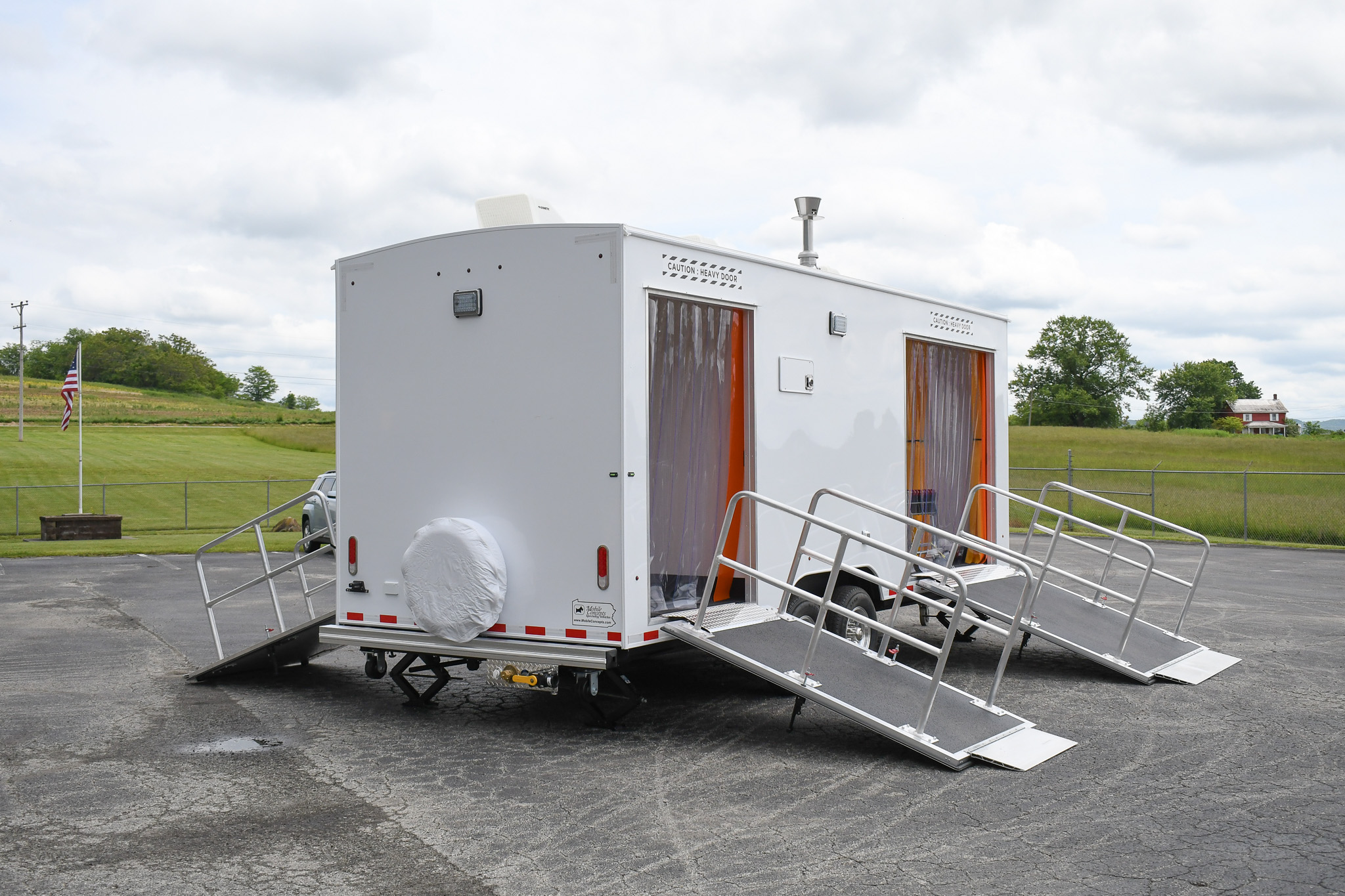 An exterior of the unit for Peterson AFB in CO. The ramps are down.