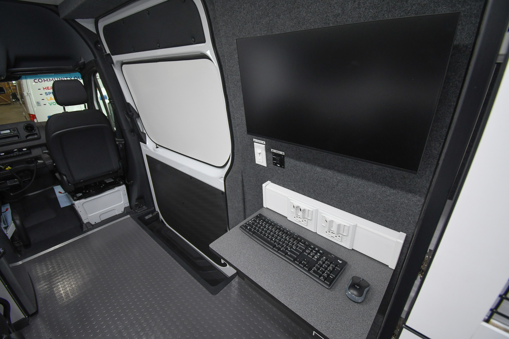 An alternate view of the fold-up desk and monitor inside the unit for Jackson, MS.