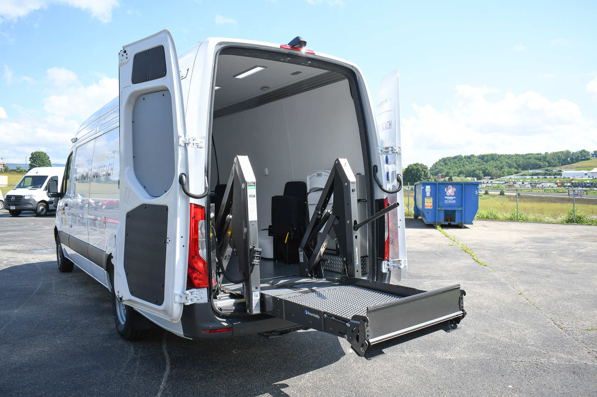 The rear doors of the unit for Pittsburgh, PA are open to reveal the wheelchair lift. It is partially lowered.