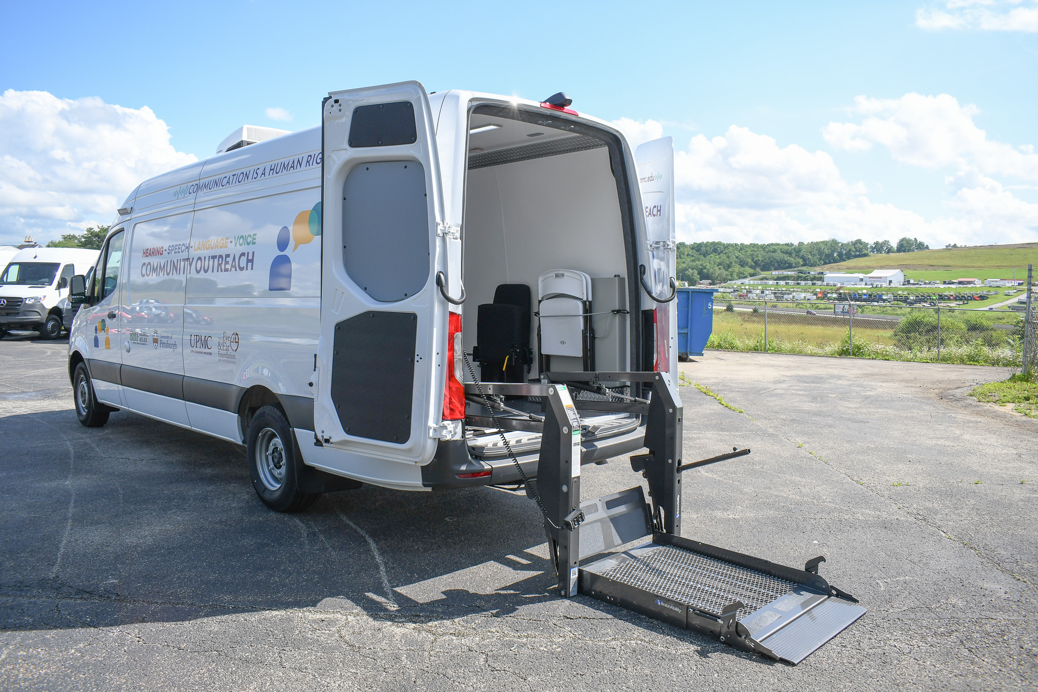 The rear doors of the unit for Pittsburgh, PA are open to reveal the wheelchair lift. It has been fully lowered.