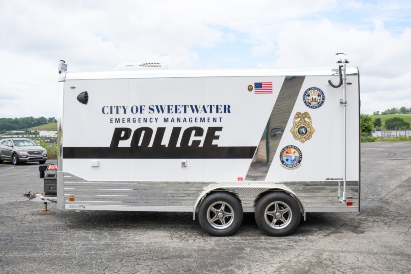 An alternate side view of the Command 20 Cargo Supply trailer made for Sweetwater, FL.