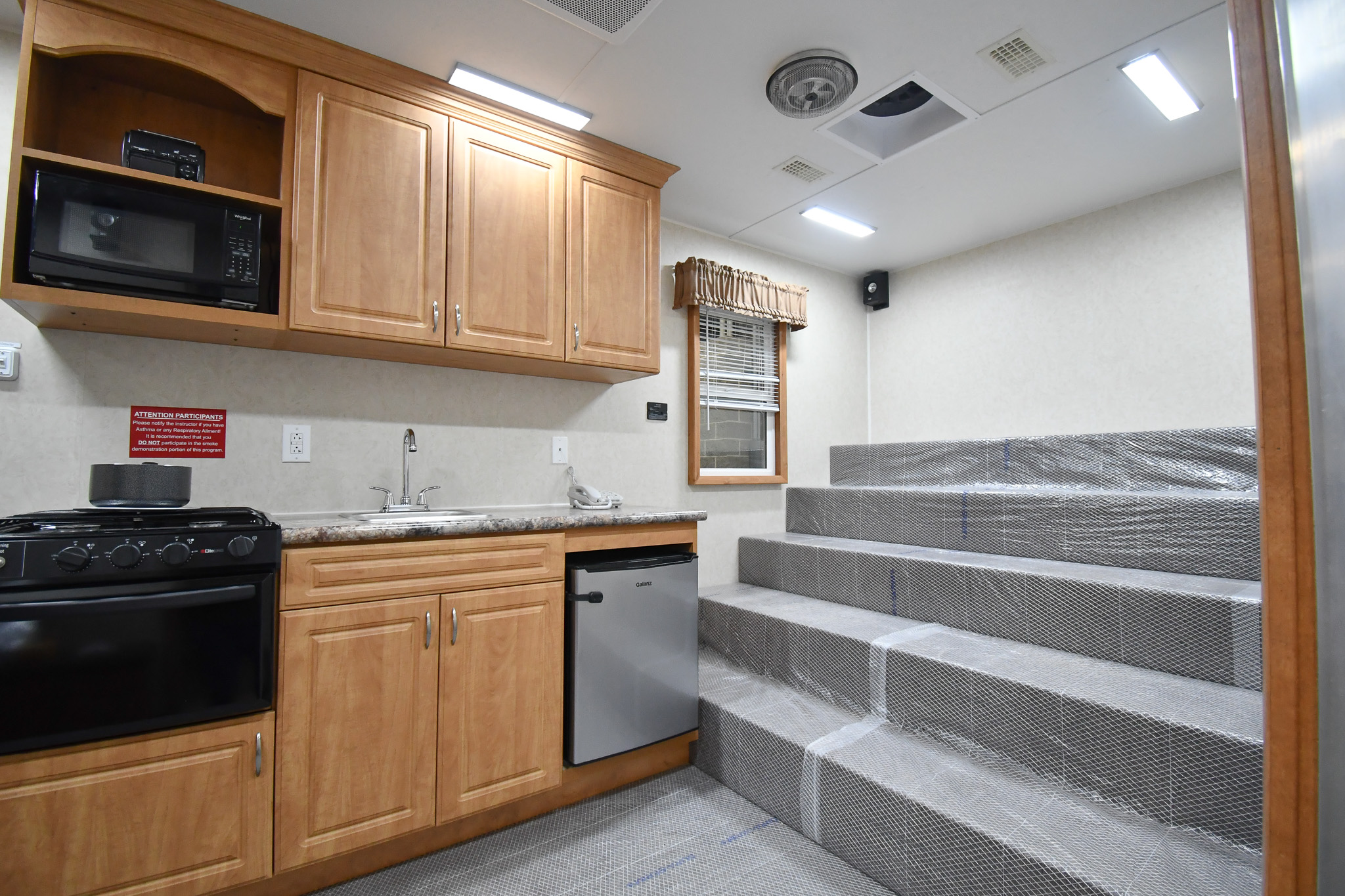 A view of the kitchen stage inside the unit for Lancaster, TX.