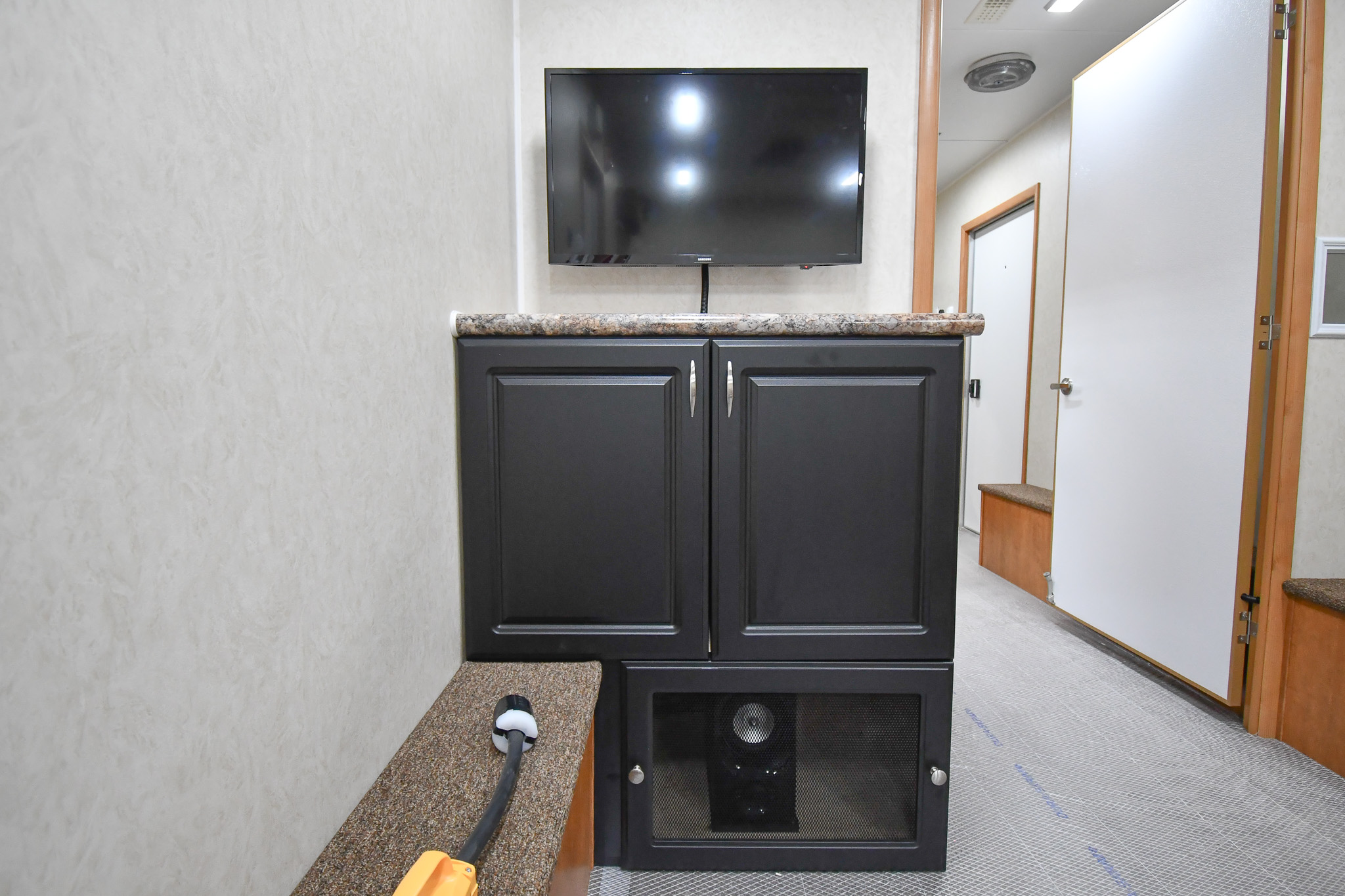 The entertainment center inside the unit for Lancaster, TX.