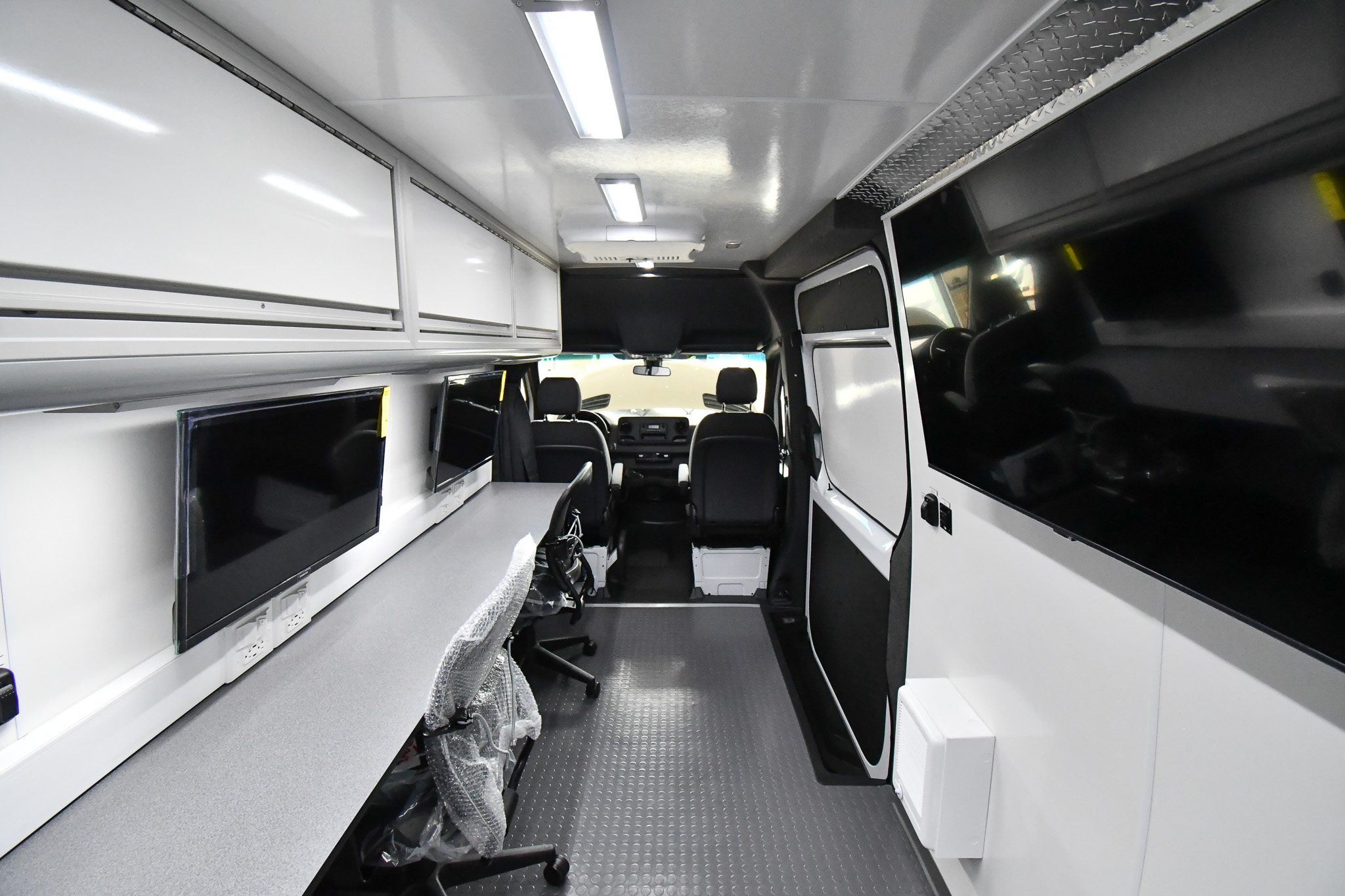 A back-to-front interior view of the sprinter for the 2025 Utility Expo in Louisville, KY.