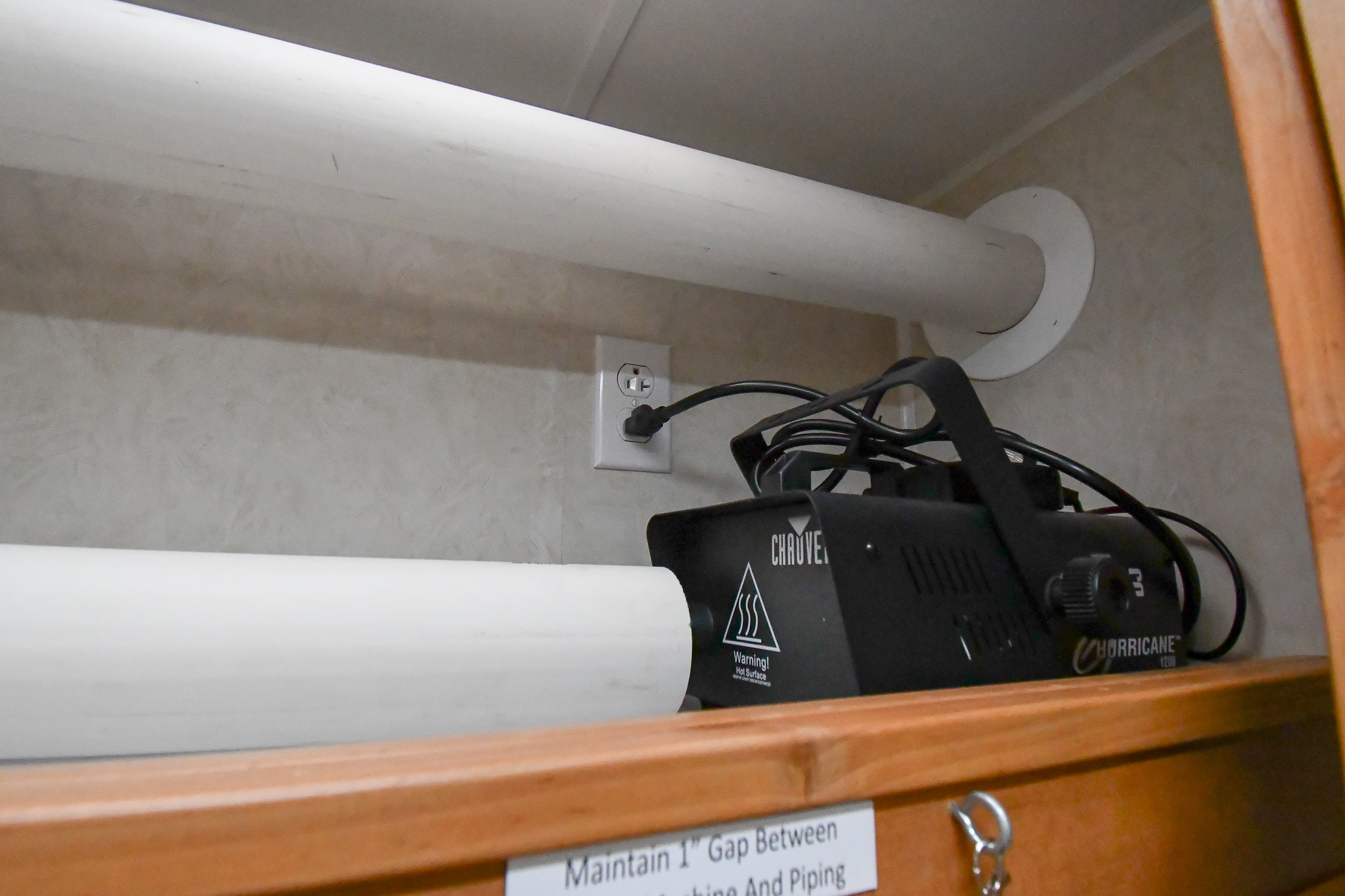 The smoke machine and piping in the control room inside the unit for Wantagh, NY.