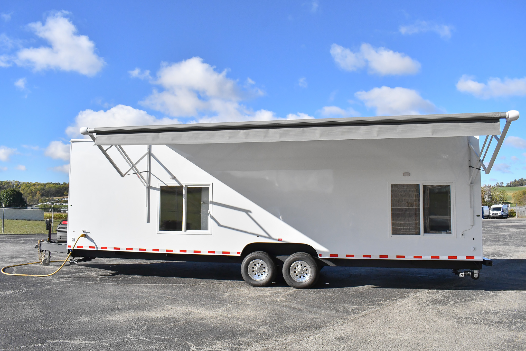 An alternate side view of the 35-2Bedroom for Wantagh, NY. The awning is deployed.
