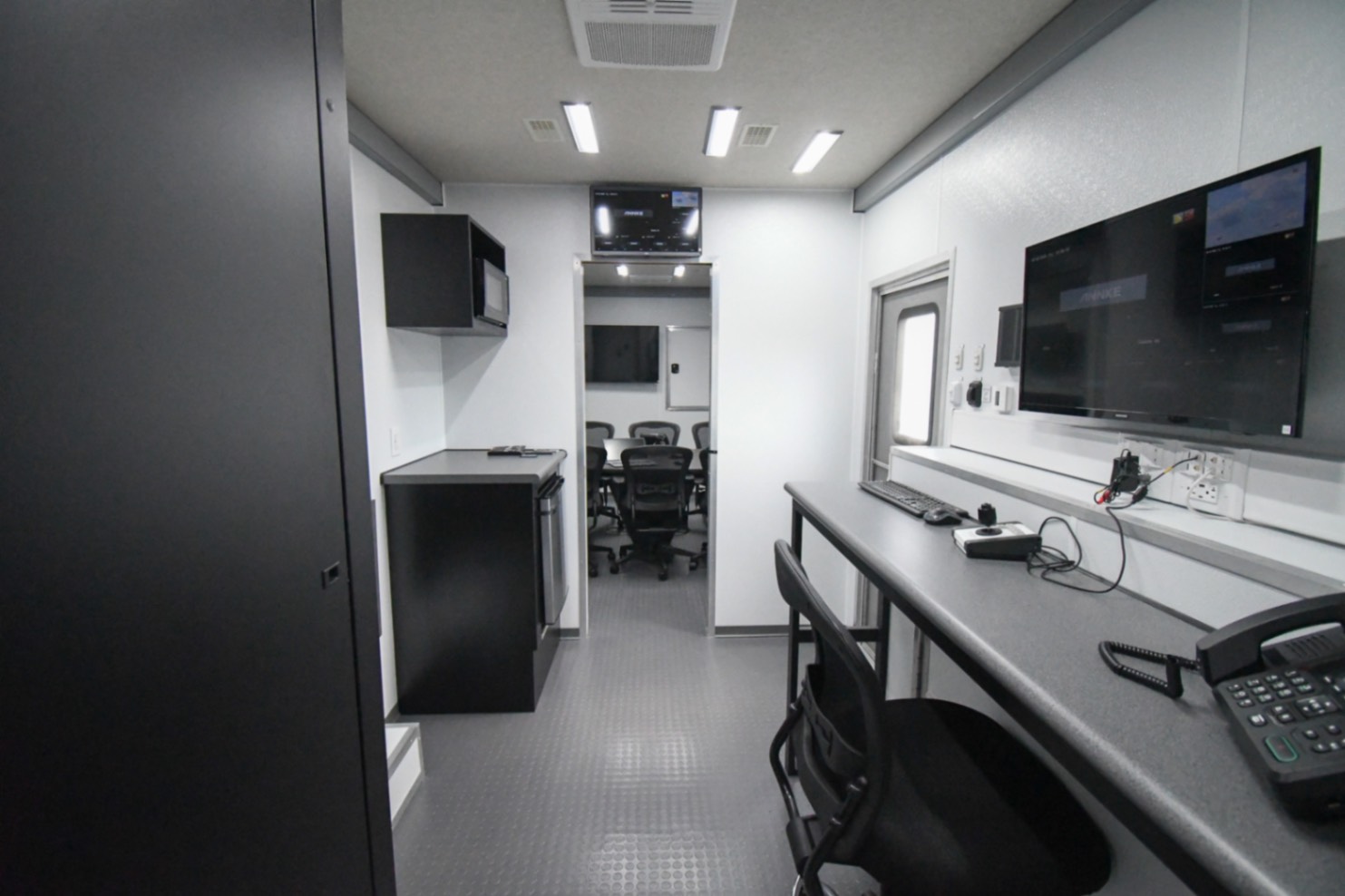 A back-to-front view of the Command 42-5WS FW 2SO made for Sweetwater, FL. It is taken from the doorway entering the middle section.