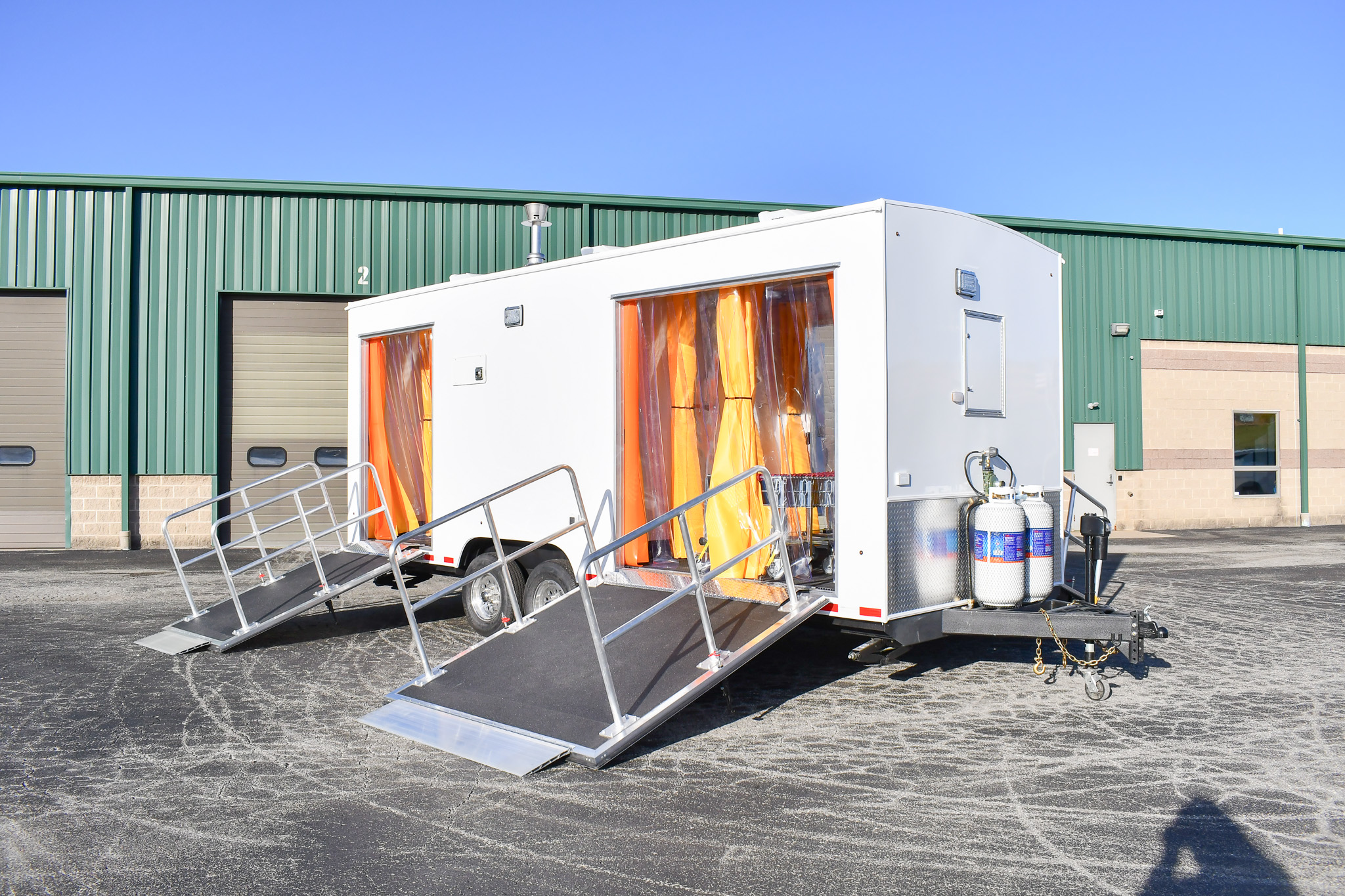 An exterior view of the DECON 24-3L for Concord, CA. The doors are open.