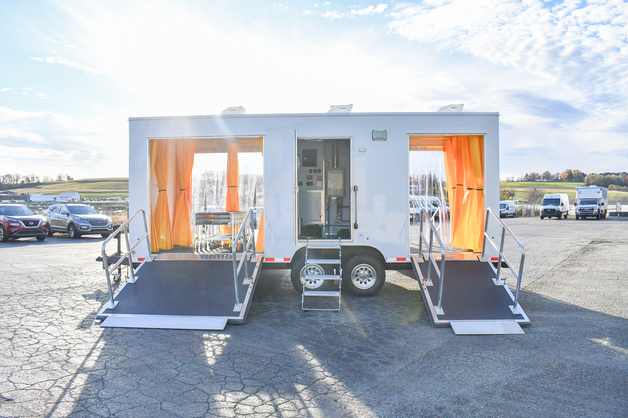 An alternate side view of the DECON 24-3L for Concord, CA. The doors are open.