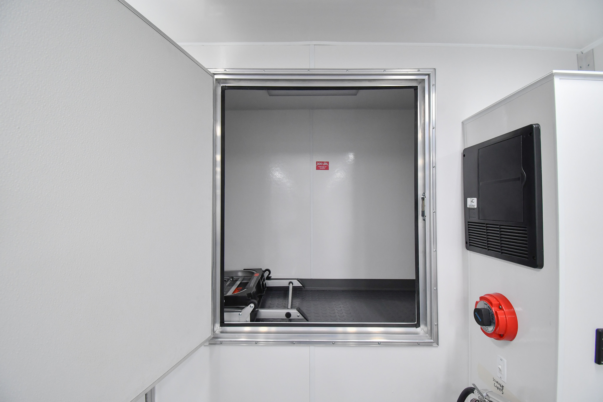 The cabover storage area inside the Evidence Collection Truck for Kansas City, KS.