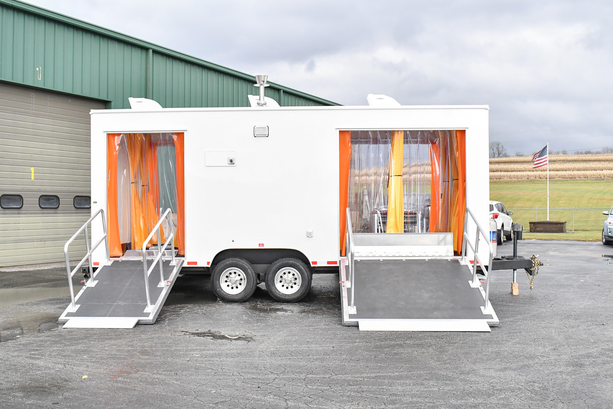 An alternate side view of the DECON 24-3L for Jackson, MS. The ramps are down.