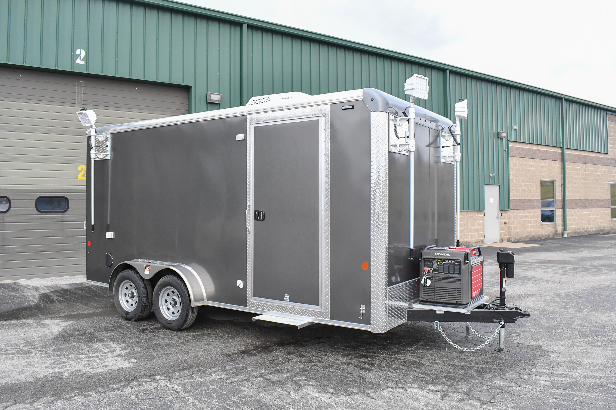 An exterior view of the Command Cargo 20 for Smithfield, NC. The LED pushup poles are down, and the rear ramp is up.