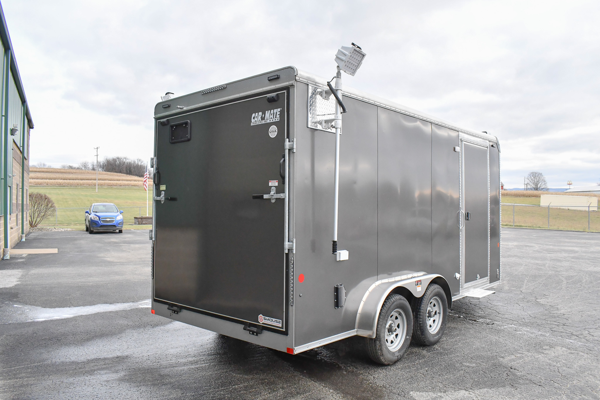 An exterior view of the Command Cargo 20 for Smithfield, NC. The LED pushup poles are down, and the rear ramp is up.