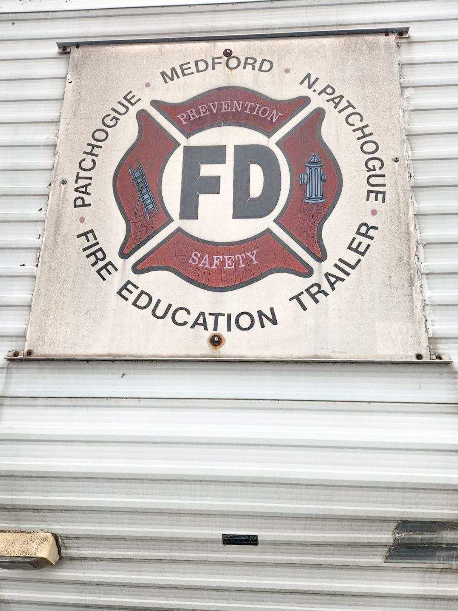 An exterior decal on Medford FD's old SCOTTY Fire House.