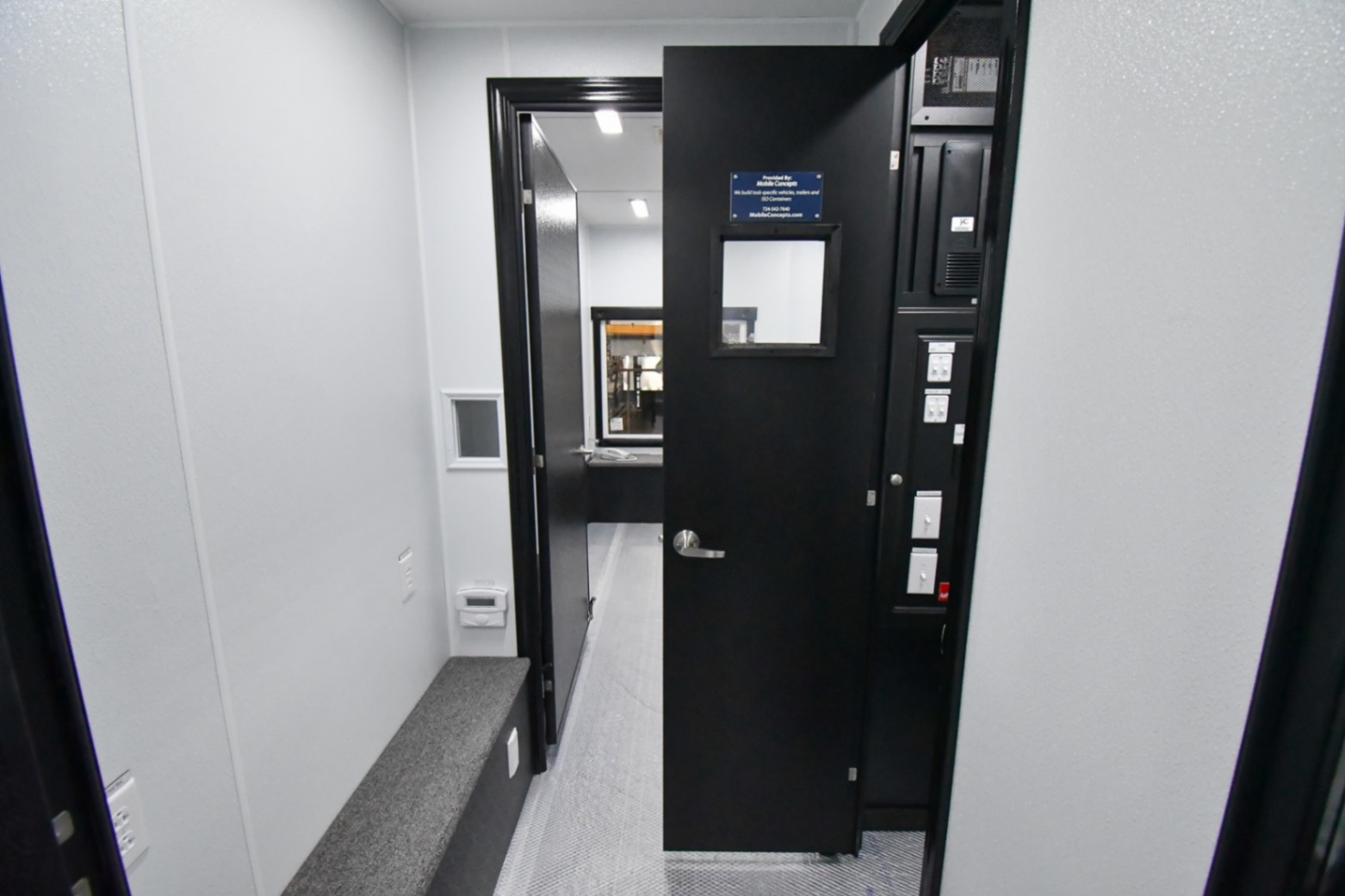 An interior view of the 31Bleacher Mod made for Burien, WA. The door to the control room is open.